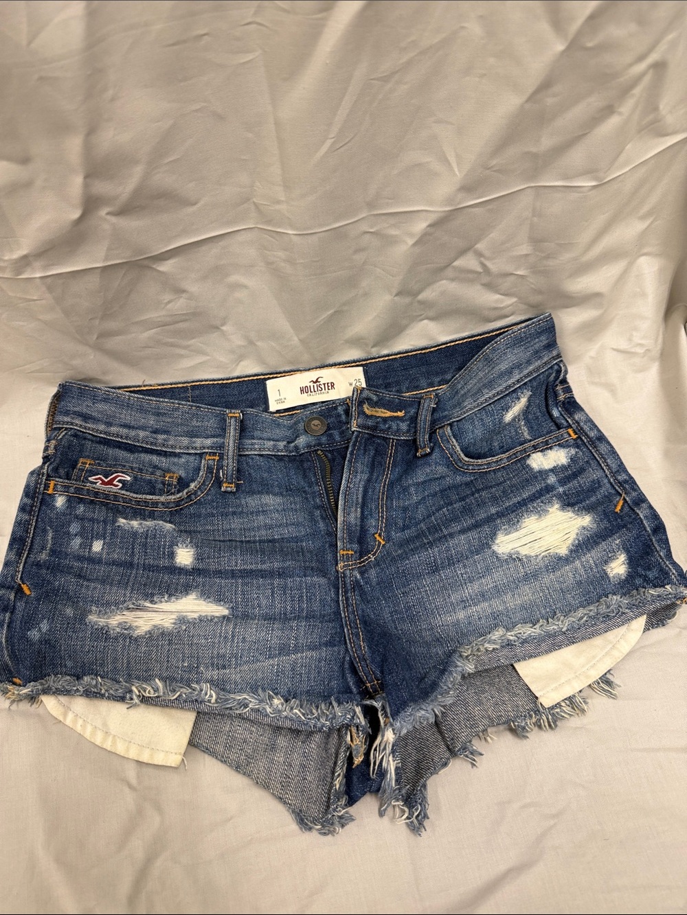 Vintage Hollister Women's Dark Blue Distressed Denim Cutoff Shorts